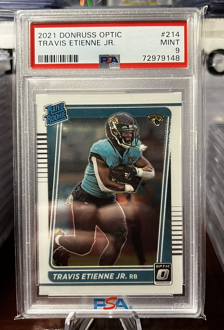 2021 Panini Donruss Optic Travis Etienne Jr RC PSA 9 Mint #214 Rookie Jaguars